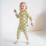 Child wearing the Children's Miffy Hello Yellow bamboo pyjama set