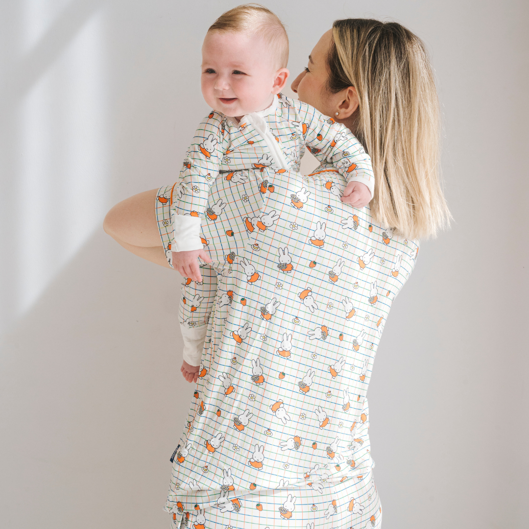 Woman wearing the Ladies Miffy Checkered Bloom bamboo pyjama set