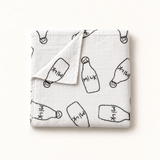 Coperta grande in mussola con motivo "Milk"
