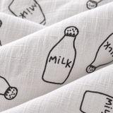 Coperta grande in mussola con motivo "Milk"