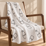 Coperta grande in mussola con motivo "Milk"