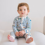 Baby wearing the ZIPSTER x Miffy Peek-a-Boo Blue bamboo babygrow