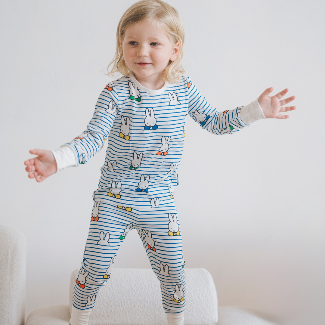 Child wearing the Children's Miffy Peek-a-Boo Blue bamboo pyjama set