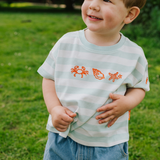 Maglietta oversize per bambini a righe con conchiglie color verde mare