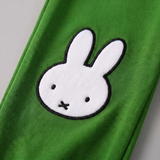 Design detail on the Miffy on the Move bamboo lounge set with bicycle sweatshirt and green joggers