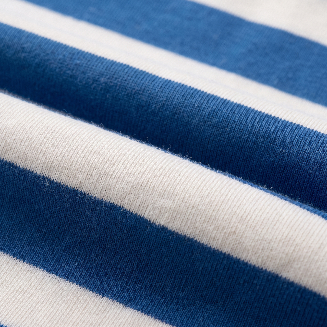 Close-up of the soft bamboo fabric of the Miffy on the Move bamboo lounge set with bicycle sweatshirt and green joggers